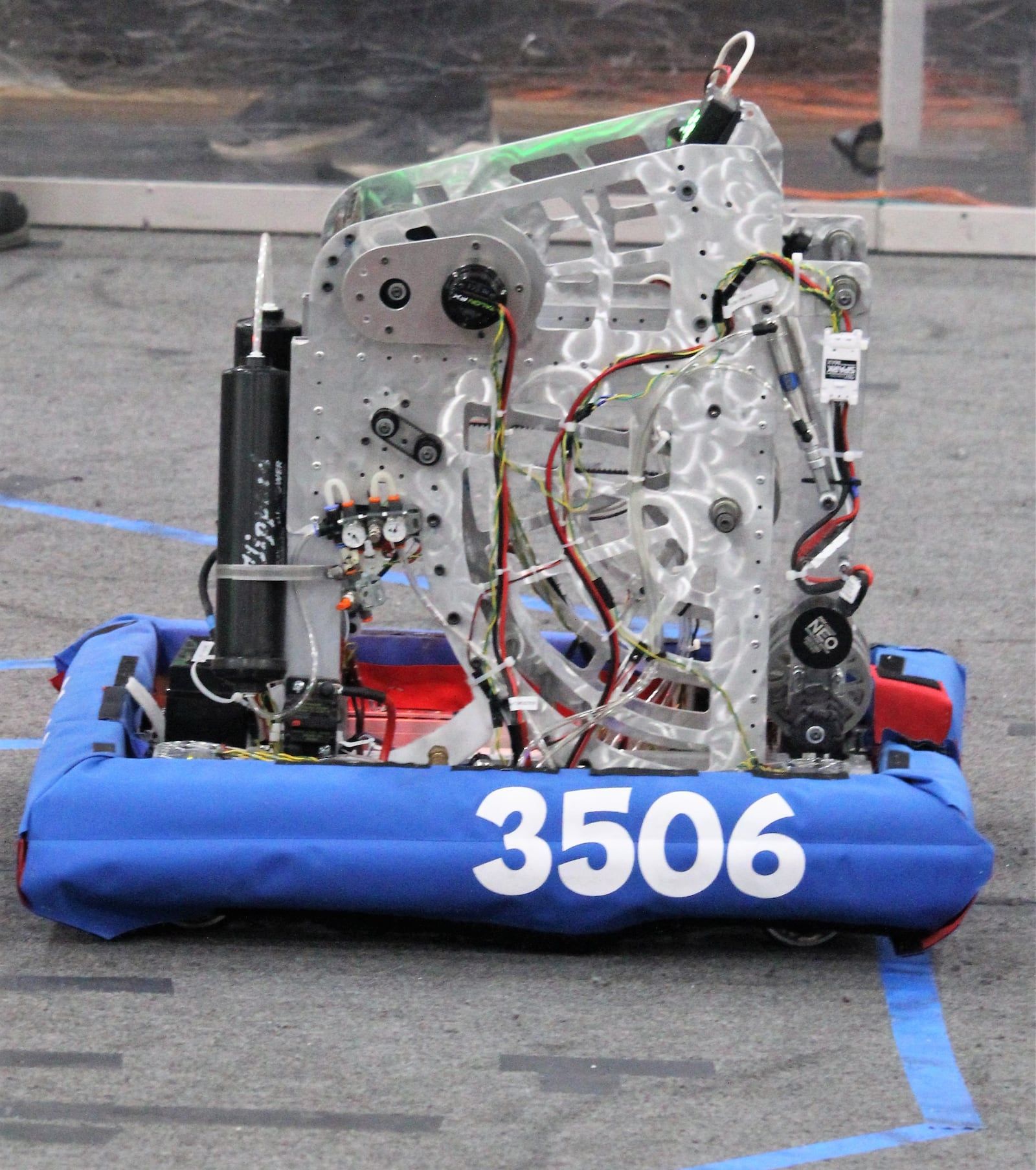 Borealis, the 2022 offseason robot, on the field with blue bumpers
